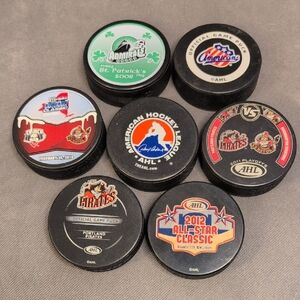 Lot Of 7 American Hockey League Pucks